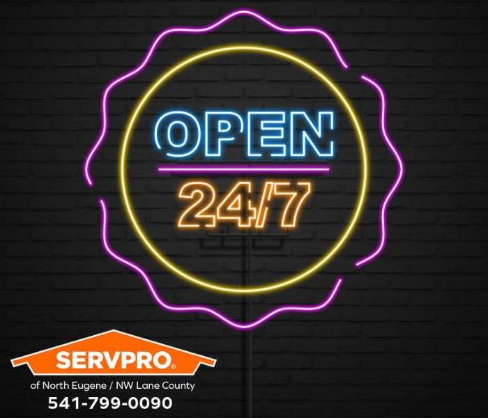 A neon sign reading, open 24/7 is shown.
